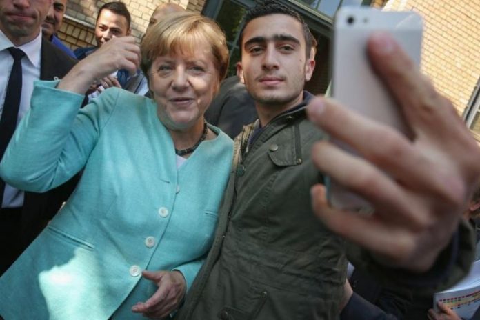 angela merkel, anas modamani, selfie